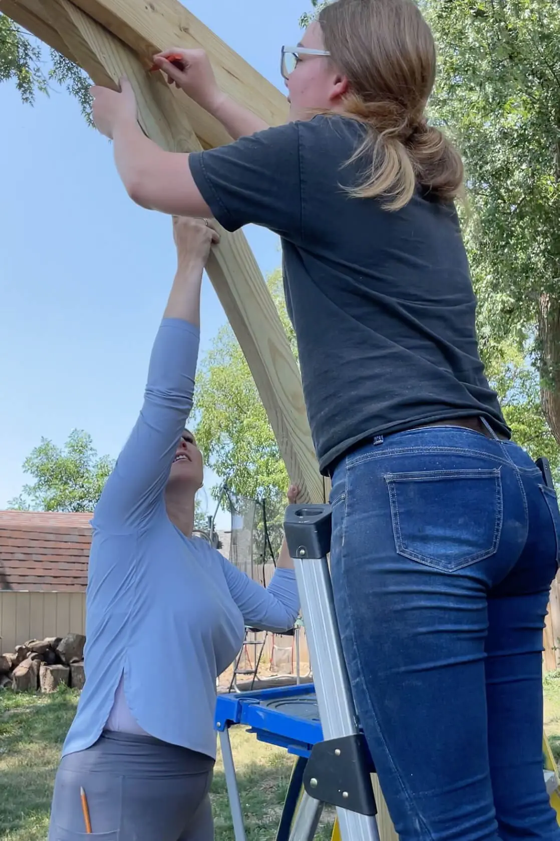 Building a backyard hammock stand.